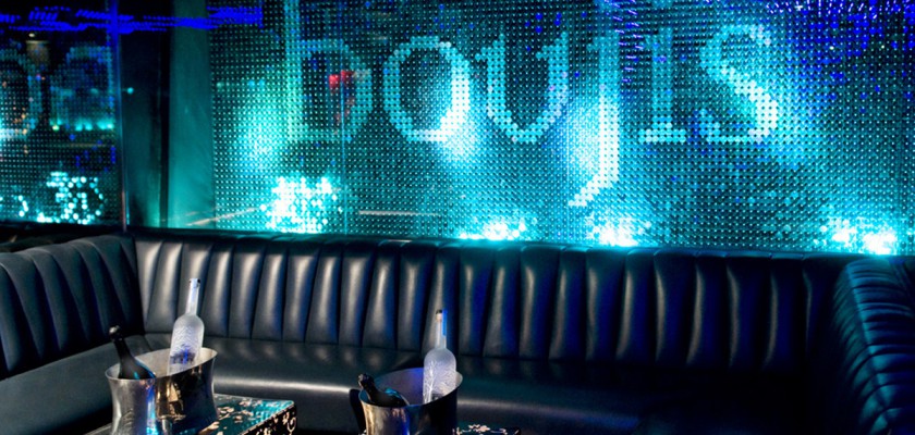 boujis_bar_seating and bottles